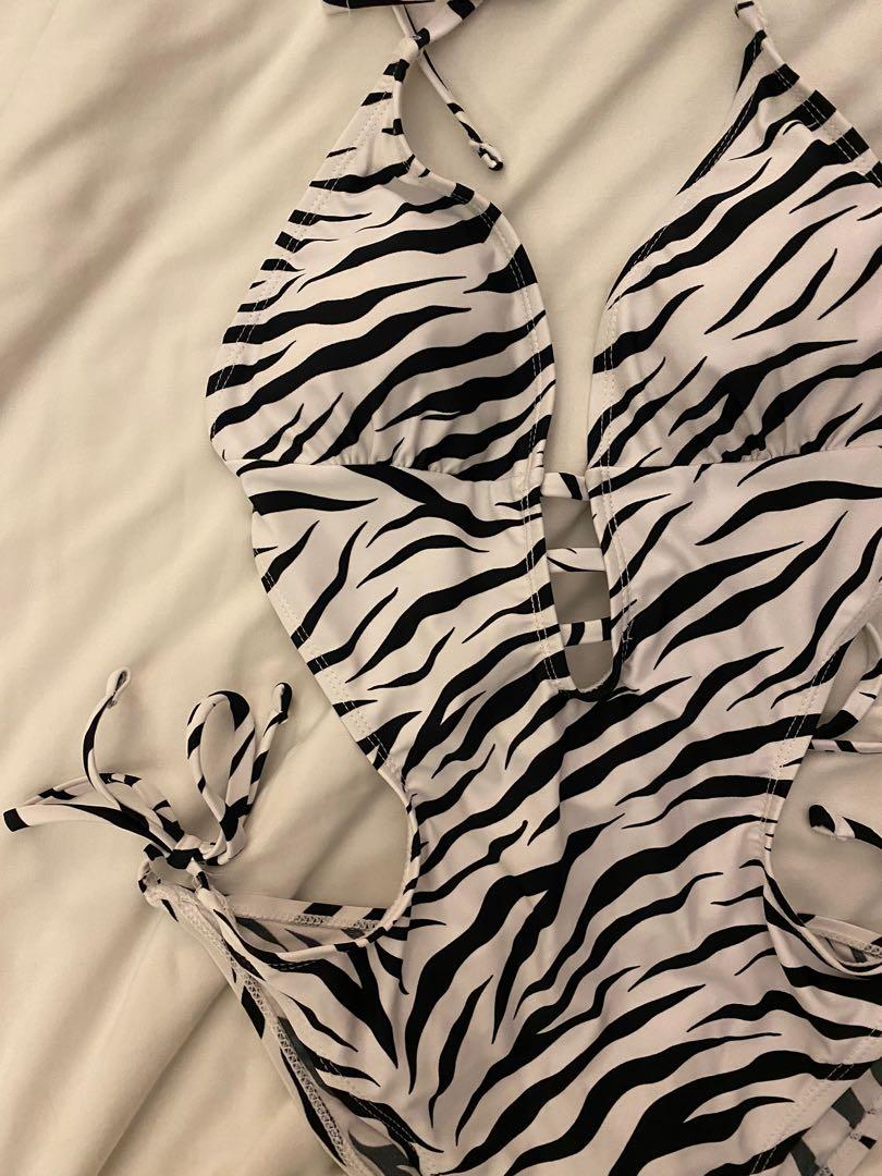 Shein Zebra One Piece (Category: Bikinis & Swimsuits) located in Cebu City. Submitted by vanmags (Listing ID 1171129369, Image 2). Description: Good as brand new No flaws Stretchable Can fit up to Semi Large With surprise freebie if 5 items and up Rfs: decluttering .