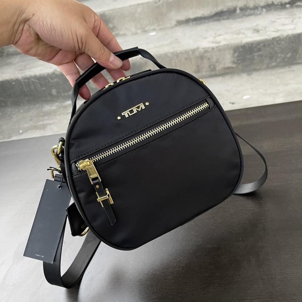 Harga handbag tumi sales