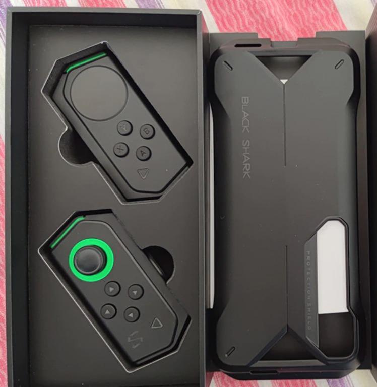 XIAOMI Black Shark Double Bluetooth Gamepad HJ66 For Mi 10 Controller (Category: Cases & Sleeves) located in Marikina City. Submitted by skowshop (Listing ID 1171213429, Image 3). Description: About this item: Brand Name: XIAOMI Interface Type: bluetooth (4.2) FEATURES: Compact, lightweight, and easy to carry anywhere With 12 customizable buttons, physical joystick, and precision touchpad Connects in an instant. Snap and play Charges in a flash a