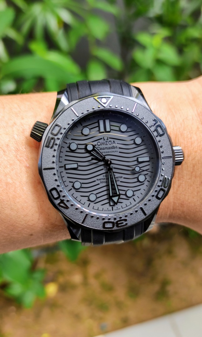 All black top omega watch