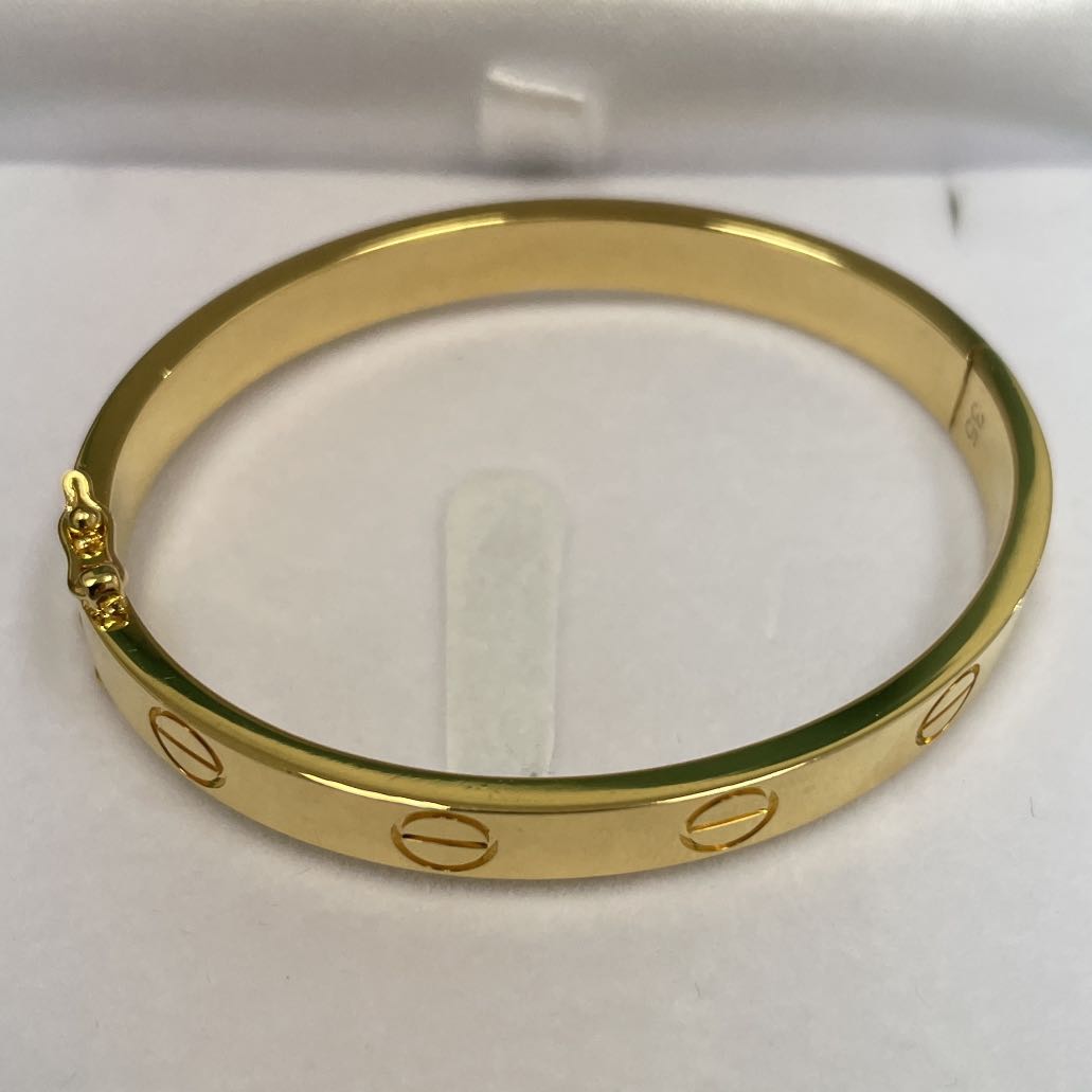 Gold bangle bracelet with screws outlet