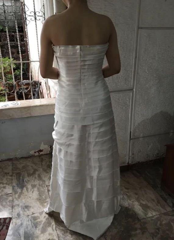 BCBG Max Azria Long White Dress (Category: Evening dresses & gowns) located in Bulacan. Submitted by madchen05 (Listing ID 1171384098, Image 3). Description: BCBG Max Azria Long White Dress 🌟Authentic from USA 🌟Preloved, good as new 🌟Fits medium 🌟P1,000.00 only + delivery fee.