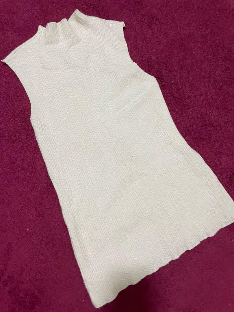 white high neck sleeveless blouse