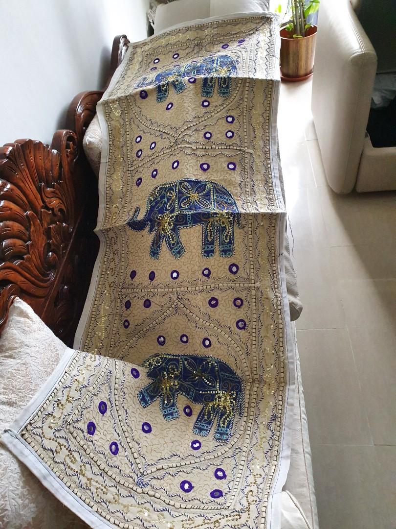 Table Runner (Category: Carpets & Mats) located in Singapore. Submitted by pansy_flower (Listing ID 1171265651, Image 1). Description: Pure cotton table runner with heavily embroidered motifs. Perfect for hosting guests' at home and festivals. Length...149 cms, Breadth ...50 cms.