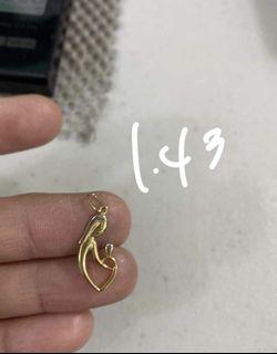 18K Saudi Gold mother and child pendant