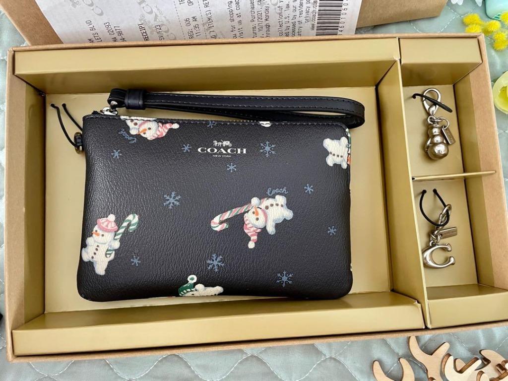 Coach snowman wristlet clearance