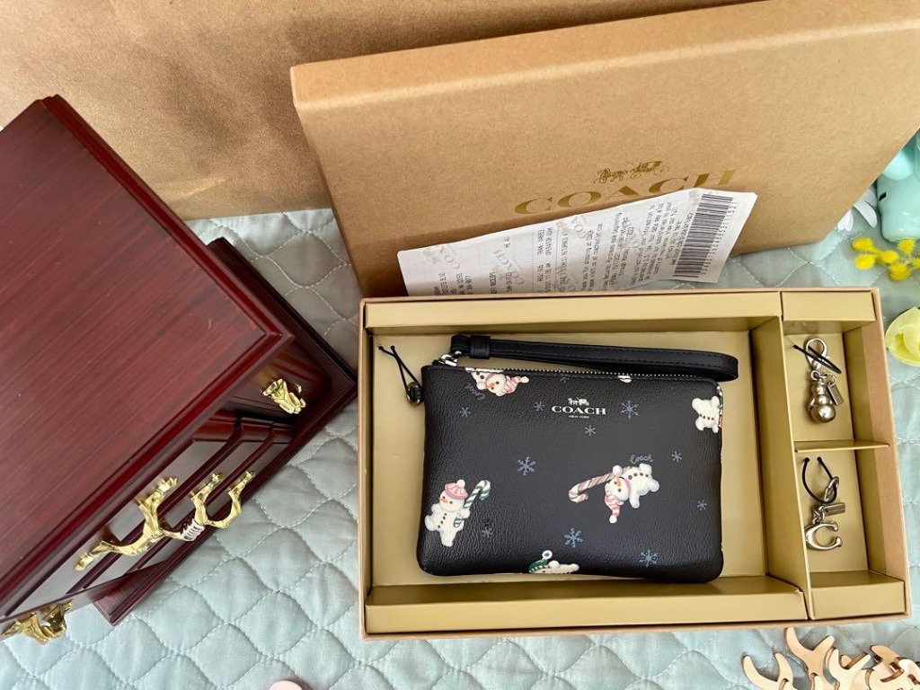 Coach snowman wristlet clearance