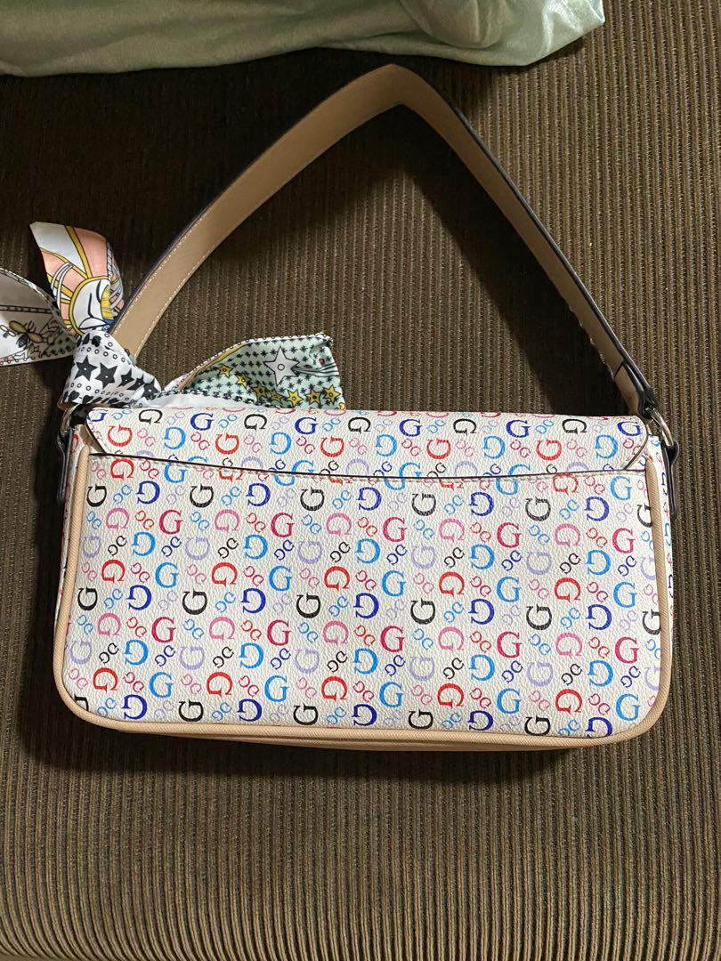 Guess flap bag kilikili bag (Category: Shoulder Bags) located in Makati City. Submitted by kach15 (Listing ID 1171470052, Image 2). Description: Guess Flap shoulder bag, original With removable strap to be used as sling bag Bought in Canada Rarely used.
