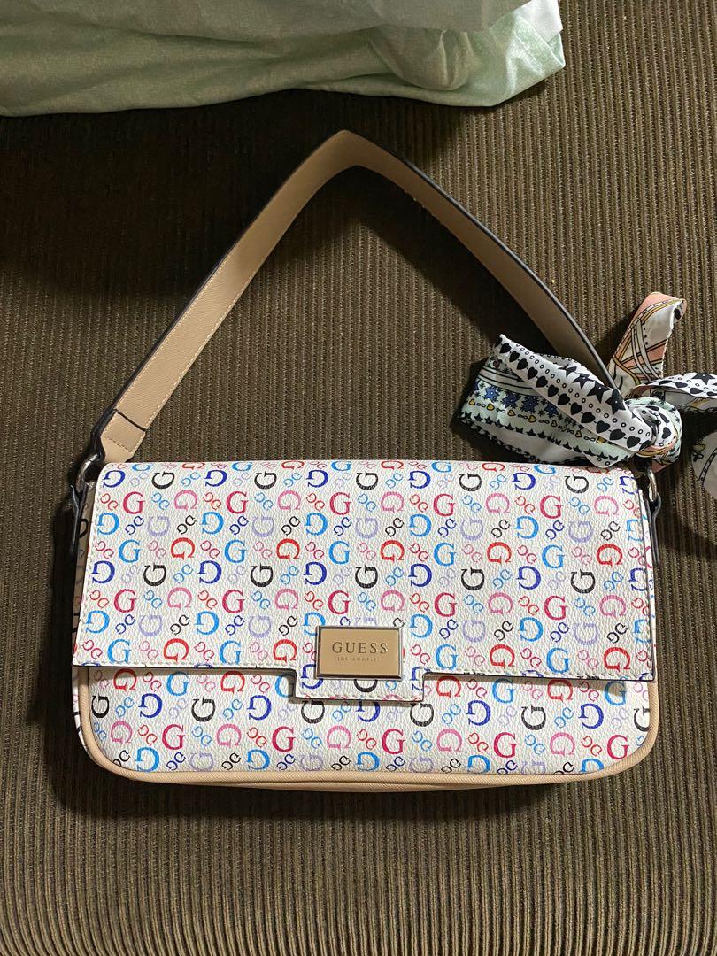 Guess flap bag kilikili bag (Category: Shoulder Bags) located in Makati City. Submitted by kach15 (Listing ID 1171470052, Image 1). Description: Guess Flap shoulder bag, original With removable strap to be used as sling bag Bought in Canada Rarely used.