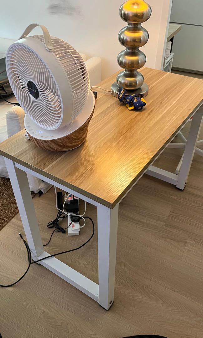 Normal table (Category: Tables & Sets) located in Singapore. Submitted by badumdumdak (Listing ID 1171476860, Image 1). Description: Length 1/1.2m. Not too sure. Good for simple home office setup. Selling because i just upgraded my table setup. Clearing asap, self-collect.