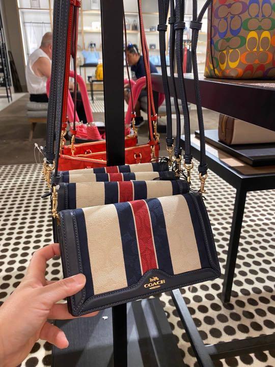PO 100 original Anna Foldover Clutch Crossbody In Signature