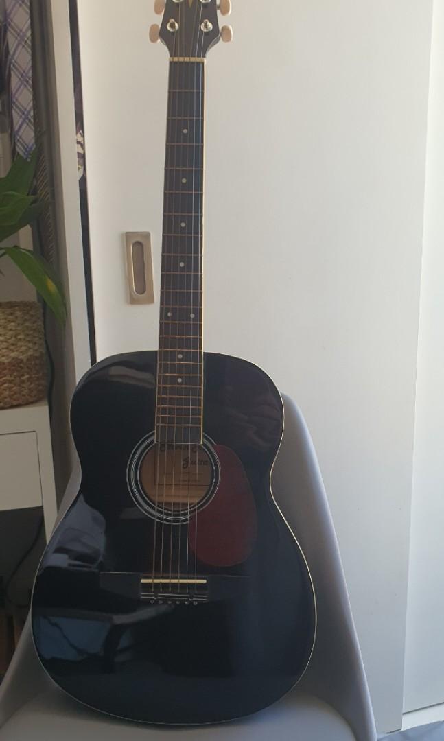 Steven Harris Acoustic Guitar with Freebies (Category: Other Audio Equipment) located in Paranaque City. Submitted by love_opaque (Listing ID 1171498204, Image 1). Description: bought in mall -Lazer Music used only for my son's guitar lesson for a year with flaws: expect scratches and crack paint due to storage see pics strings with rust already, for replacement bought around 4k+ with 11 pcs picks guitar clip guitar bag lalamove and grab only in 