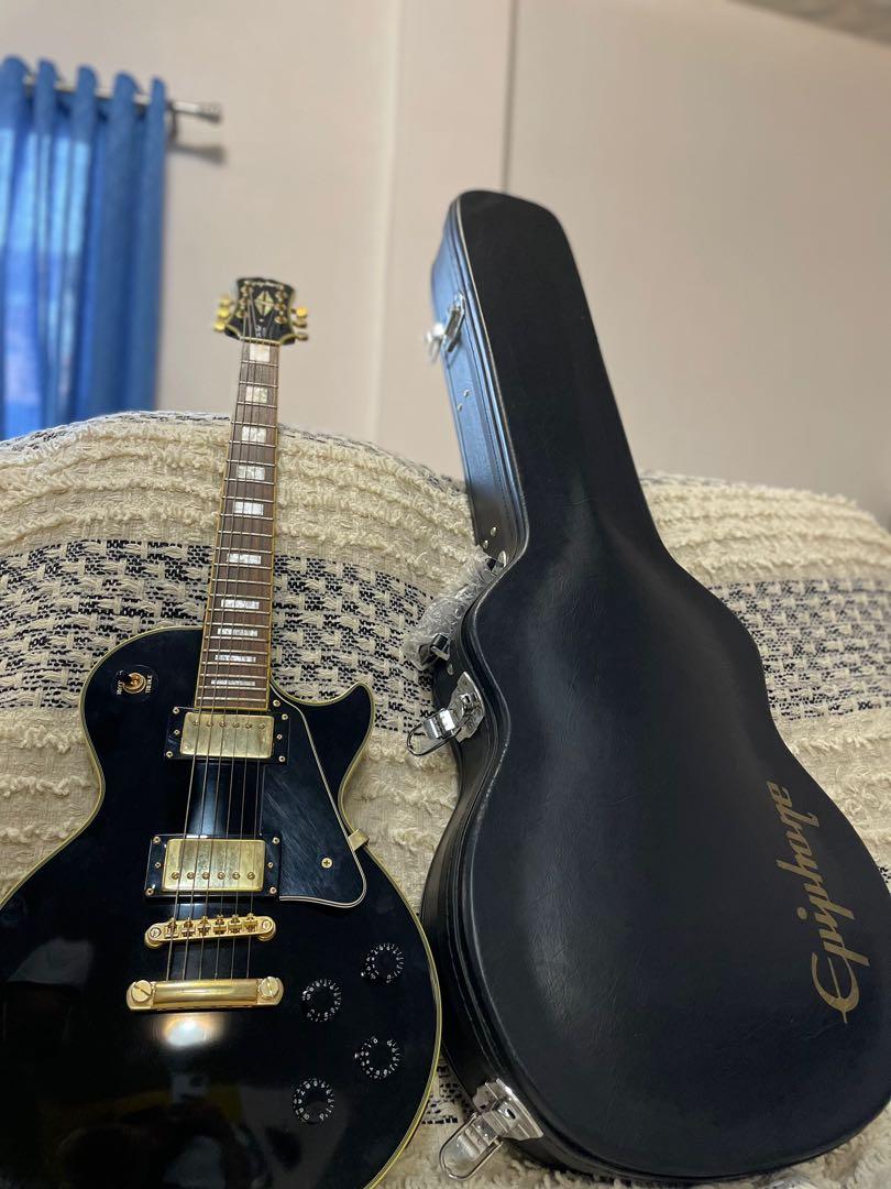 Epiphone Les Paul Custom Electric Guitar EE05123018 (Category: Musical Instruments) located in Caloocan City. Submitted by trishhhaaa (Listing ID 1175906928, Image 2). Description: All info needed is given in pictures. + With hard leather case cover NEGOTIABLE PRICE.