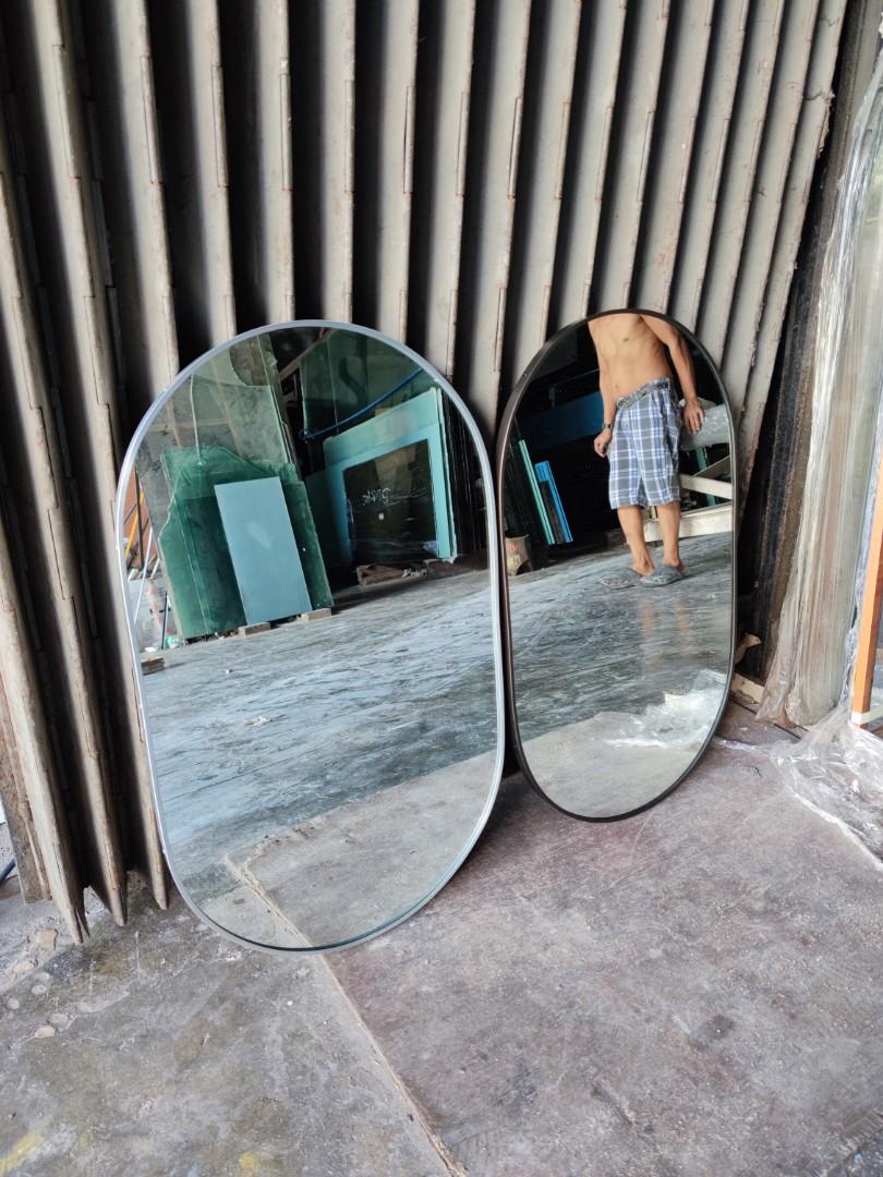 Oval Mirror with frame (Category: Mirrors) located in Malabon City. Submitted by mirrors.ph (Listing ID 1175904250, Image 2). Description: Oval mirror with aluminum frame and plywood backing. Using 6mm thick copper free lead free mirror Size: 1. 5ft x 2.5ft P1012.50 Add P200 if with back hook Available in gold, glossy black, matte black, white and silver aluminum frame. Customize sizes and shapes are welcome..