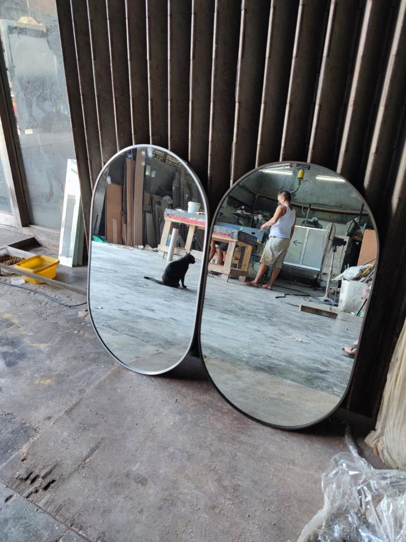 Oval Mirror with frame (Category: Mirrors) located in Malabon City. Submitted by mirrors.ph (Listing ID 1175904250, Image 3). Description: Oval mirror with aluminum frame and plywood backing. Using 6mm thick copper free lead free mirror Size: 1. 5ft x 2.5ft P1012.50 Add P200 if with back hook Available in gold, glossy black, matte black, white and silver aluminum frame. Customize sizes and shapes are welcome..