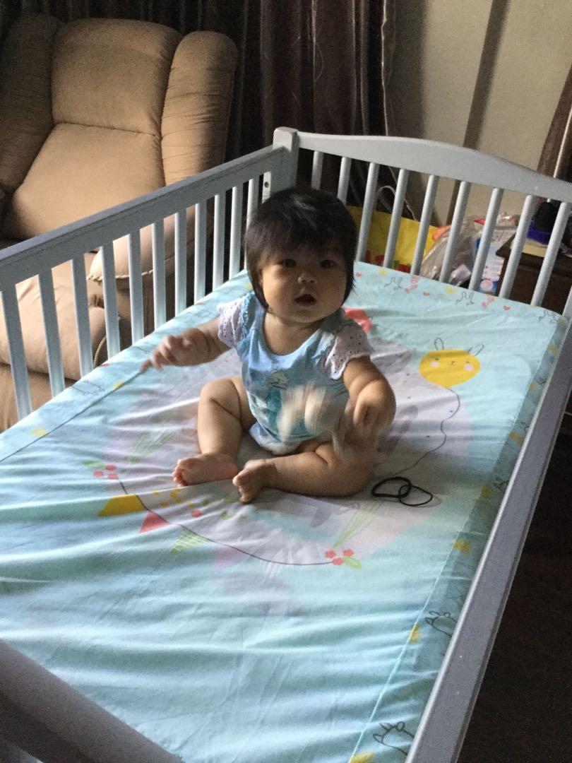 Pottery Barn gray wooden crib and mattress