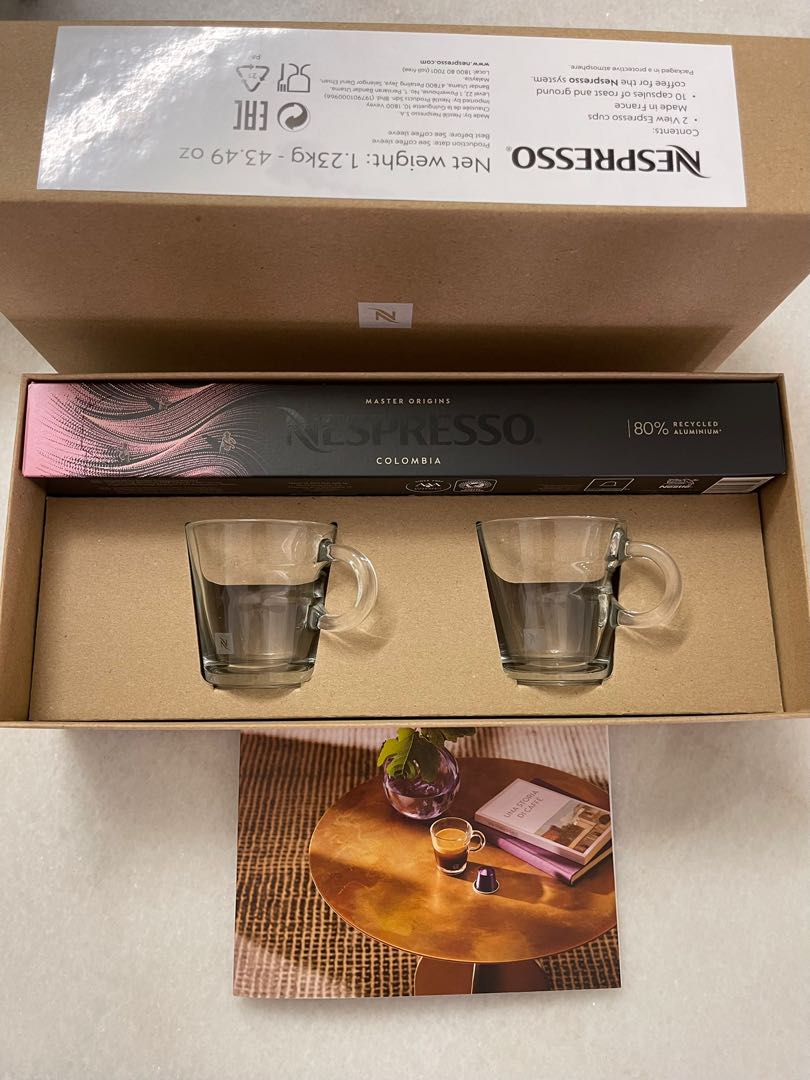 A pair of Nespresso View Espresso cups and 10 Columbia capsules