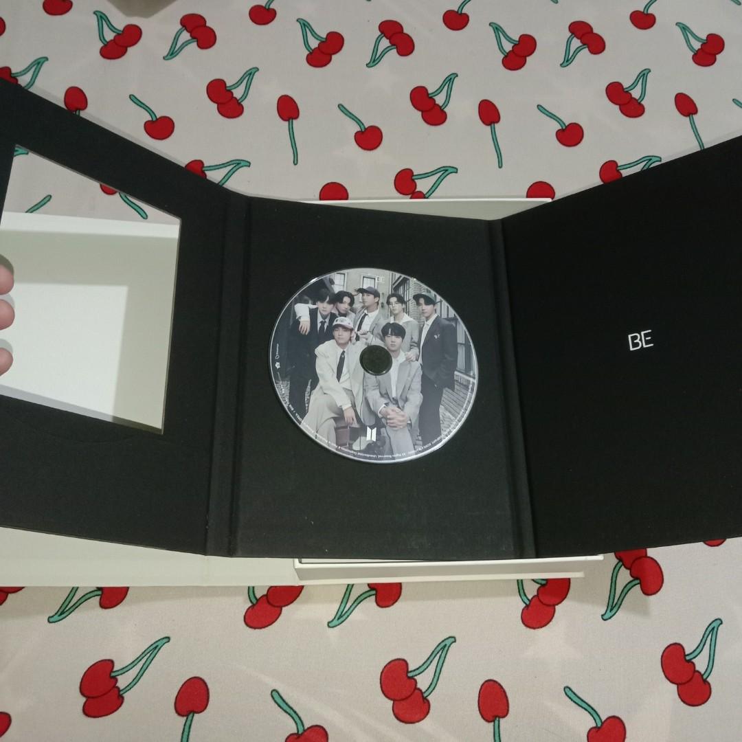 BTS - Be 5th Studio Album (Deluxe Edition) (Category: CDs & DVDs) located in Santa Rosa. Submitted by page.trish (Listing ID 1177714753, Image 3). Description: BTS - Be 5th Studio Album (Deluxe Edition) ✩ preloved but in good condition ✩ inclusions: - photobook - making book - cd (never been played) - lyric poster - 8 photocards (1 per member + 1 ot7) - ot7 polaroid photocard - photo frame - 7 postcards - folded poster - weverse qr (already scann