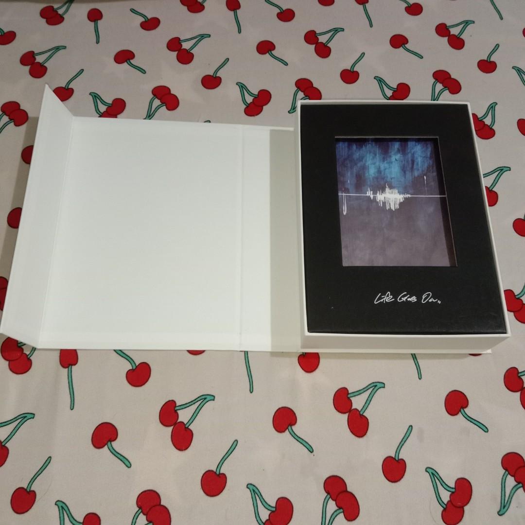 BTS - Be 5th Studio Album (Deluxe Edition) (Category: CDs & DVDs) located in Santa Rosa. Submitted by page.trish (Listing ID 1177714753, Image 2). Description: BTS - Be 5th Studio Album (Deluxe Edition) ✩ preloved but in good condition ✩ inclusions: - photobook - making book - cd (never been played) - lyric poster - 8 photocards (1 per member + 1 ot7) - ot7 polaroid photocard - photo frame - 7 postcards - folded poster - weverse qr (already scann