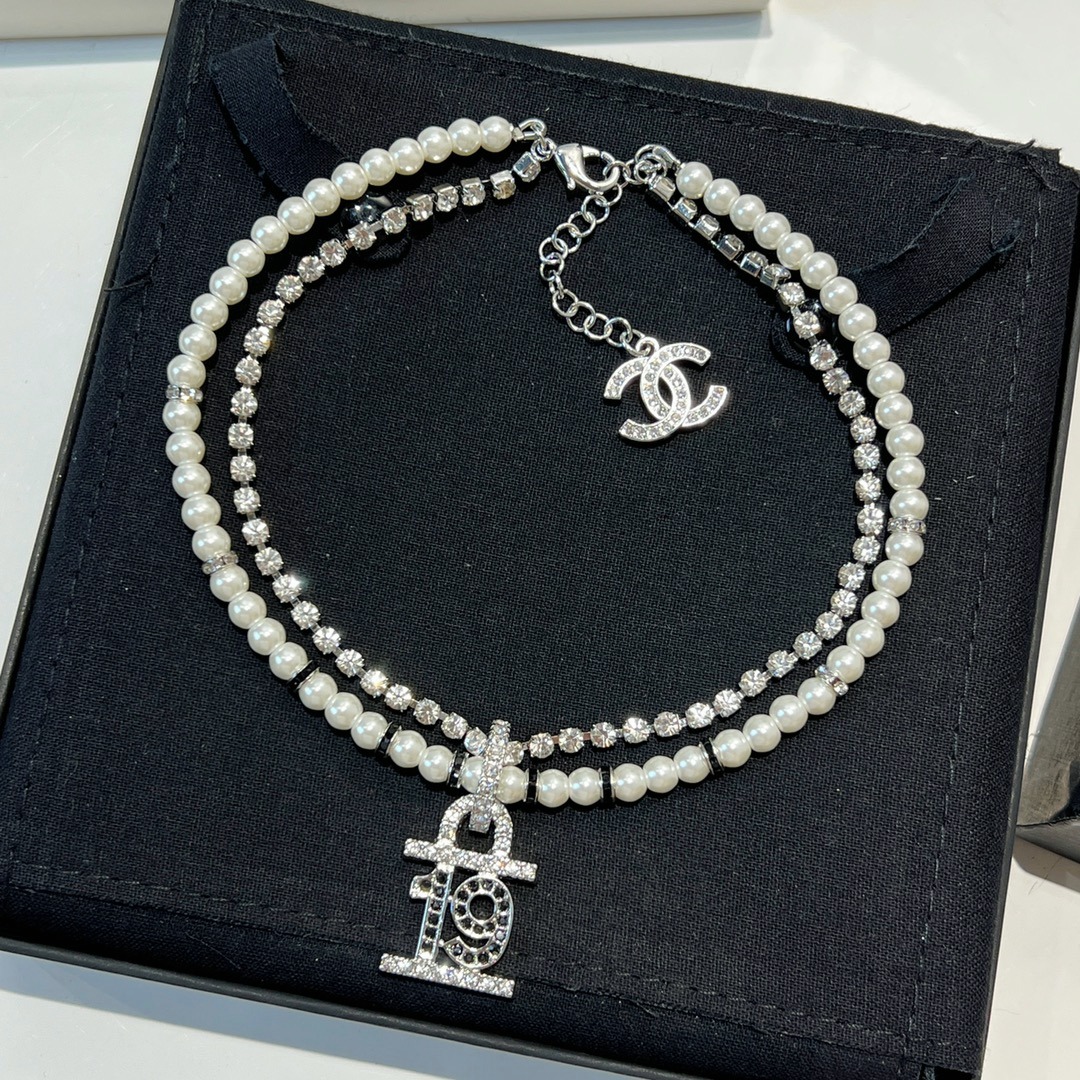 Chanel black diamond full diamond 19 pearl double necklace, Women's Fashion,  Jewelry & Organisers, Necklaces on Carousell