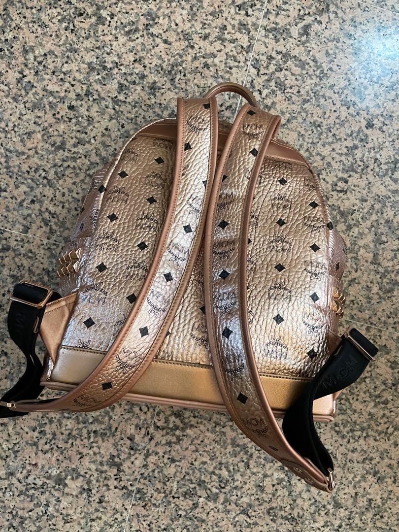 Mcm champagne hotsell gold backpack