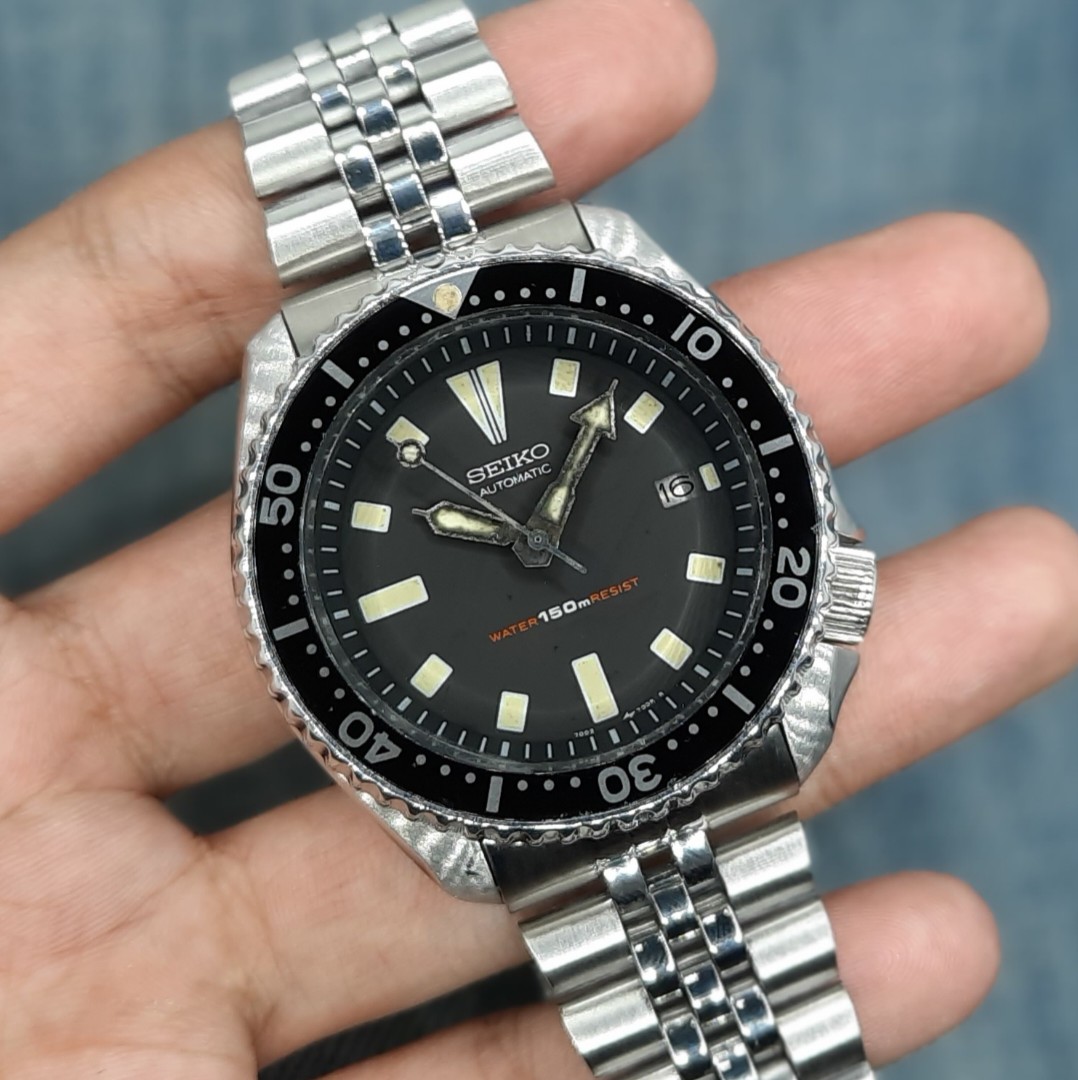 Seiko 7002-7000 Diver's 150 Meters Resist Automatic Watch, Men's Fashion,  Watches & Accessories, Watches on Carousell
