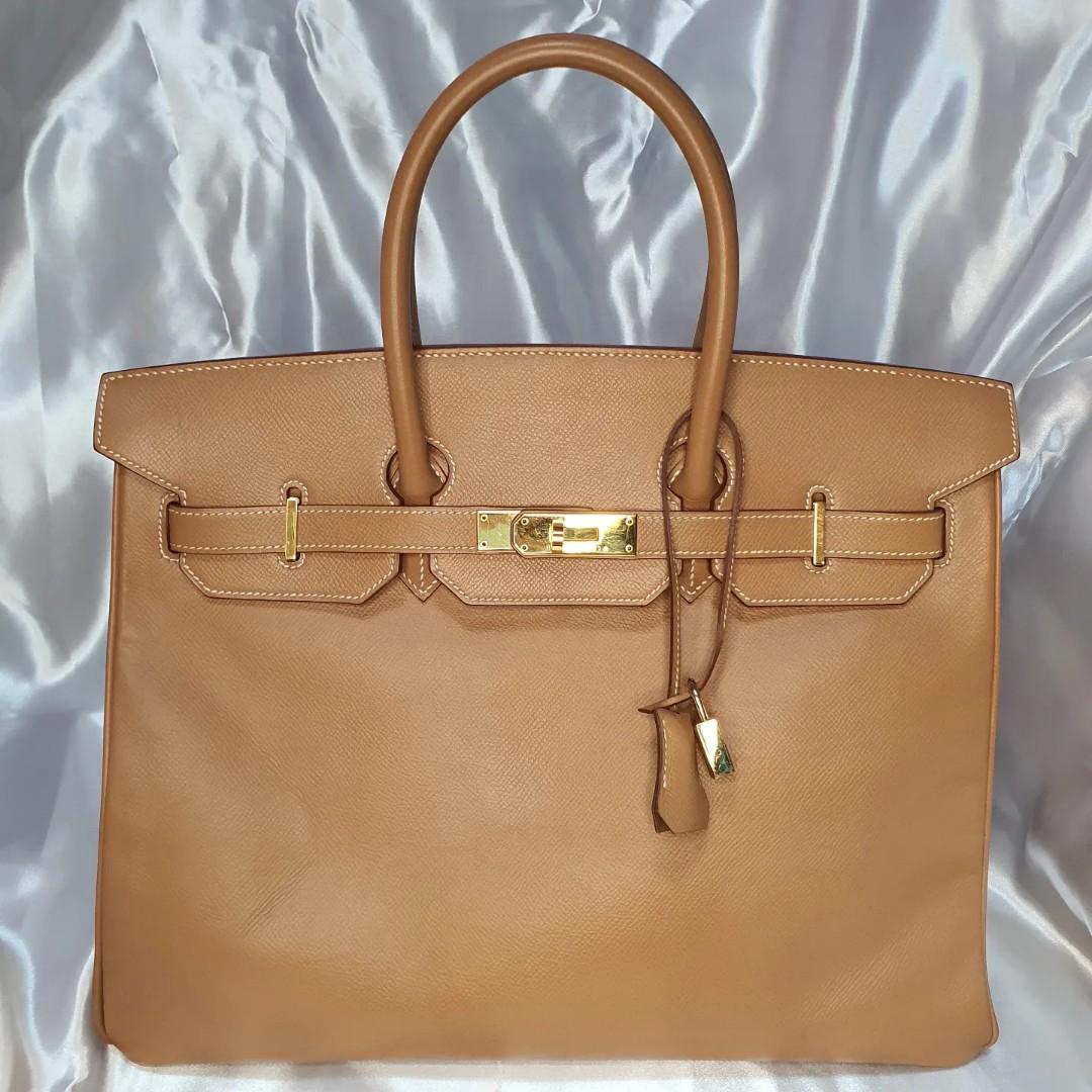 Hermes Birkin 35 (Category: Luxury Bags & Wallets) located in Paranaque City. Submitted by my_travelfinds (Listing ID 1177949204, Image 1). Description: Hermes Birkin Size: 35 Color: Natural Sable Leather: Courchevel Hardware: Gold Year stamp: B square/1998 Rank: AB+ (8.5/10 preloved condition) Inclusions: Clochette, lock, keys, dustbag, entrupy Price: Php 495,000 Please manage your expectations when buying a preloved bag. No return/No exchange u