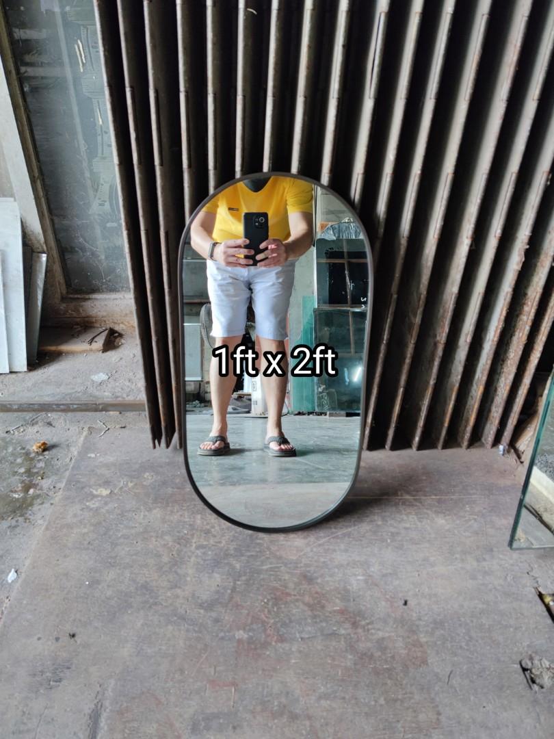 Mini oval mirror (Category: Mirrors) located in Malabon City. Submitted by mirrors.ph (Listing ID 1177939752, Image 1). Description: Mini oval mirror with black aluminum frame and plywood backing. Using 6mm thick copper free lead free mirror. Size: 1ft x 2ft P700 Add P200 if with back hook Available in gold, glossy black, matte black, white and silver aluminum frame. Customize sizes and shapes are welcome..