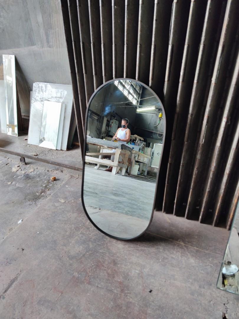 Mini oval mirror (Category: Mirrors) located in Malabon City. Submitted by mirrors.ph (Listing ID 1177939752, Image 3). Description: Mini oval mirror with black aluminum frame and plywood backing. Using 6mm thick copper free lead free mirror. Size: 1ft x 2ft P700 Add P200 if with back hook Available in gold, glossy black, matte black, white and silver aluminum frame. Customize sizes and shapes are welcome..
