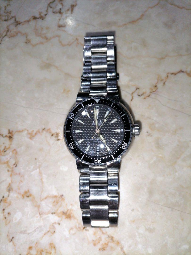Oris 7533P (Category: Men's Watches) located in Manila. Submitted by merakicch (Listing ID 1177897690, Image 3). Description: Brand: Oris (Swiss made watch) Model: Divers Watch Reference number: 7533P Movement: Automatic Case Material: Stainless Steel Bracelet Material: Stainless Steel Price is fix..