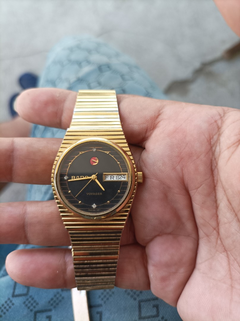 Rado voyager sale gold