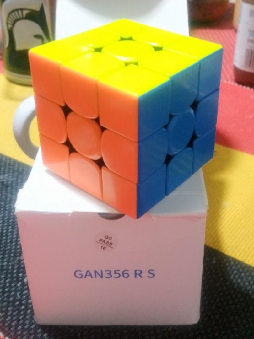 GAN 356 RS 3x3 Speed Rubik's Cube Stickerless (Category: Board Games & Puzzles) located in Baguio. Submitted by sellerman69 (Listing ID 1178154405, Image 1). Description: Product description: I use this product for every day in 1 month but now I have New rubik's cube so now it is just in the storage place It have a tutorial in algorithms (CFOP) but it does not have tutorial how to solve cube and it features are anti-pop, corner cutting smooth tur