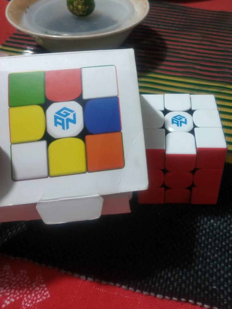 GAN 356 RS 3x3 Speed Rubik's Cube Stickerless (Category: Board Games & Puzzles) located in Baguio. Submitted by sellerman69 (Listing ID 1178154405, Image 3). Description: Product description: I use this product for every day in 1 month but now I have New rubik's cube so now it is just in the storage place It have a tutorial in algorithms (CFOP) but it does not have tutorial how to solve cube and it features are anti-pop, corner cutting smooth tur