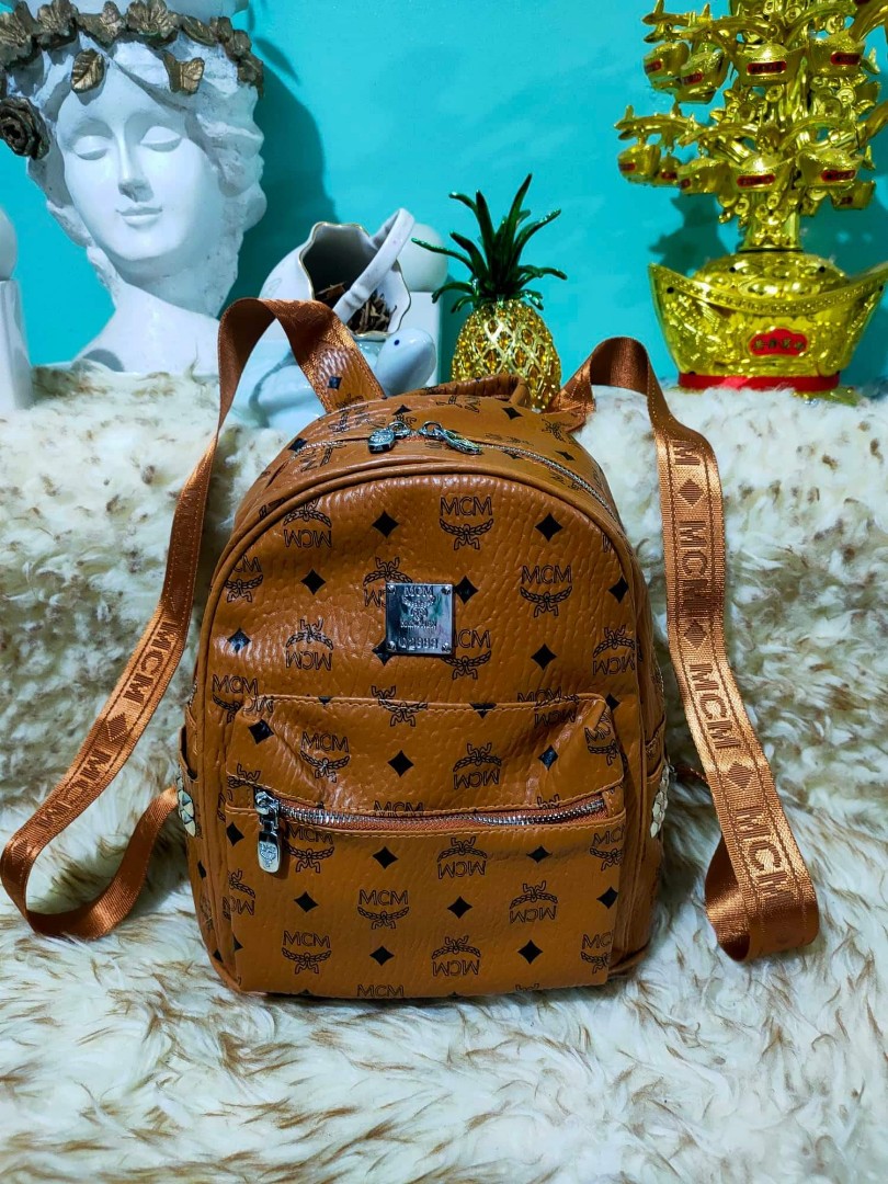 Legit MCM backpack turnable screws, Luxury, Bags & Wallets on Carousell