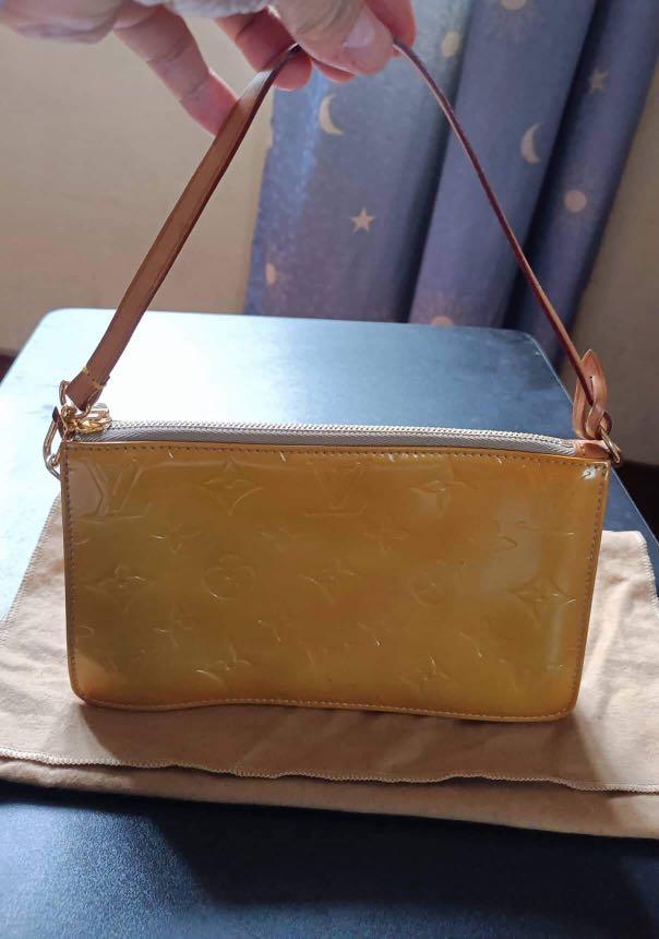 Original Louis Vuitton Vintage Pochette (Category: Luxury Bags & Wallets) located in Pasig City. Submitted by marjories22 (Listing ID 1178094971, Image 2). Description: Original Louis Vuitton Vintage Vernis Lexington Pochette Beige Leather and Vachetta Leather Pouch. Top Zip, Flat Leather Size - 8 X 5 Drop - 5 Like New, Never Used or Carried. RFS: Decluttering Please Take Note : That this bag has been stocked up in the closet for a long time. NO 