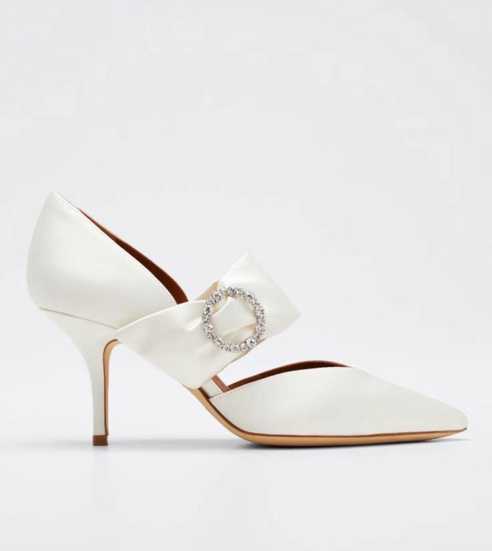 Malone Souliers Crystal Pumps (Category: Sneakers & Footwear) located in Makati City. Submitted by _collectorschoice_ (Listing ID 1178400798, Image 2). Description: Malone Souliers Maite Crystal-Buckle Satin Point-Toe Pumps ° Malone Souliers satin pumps with crystal buckle detail ° Crossover strap with elastic insert at mid-vamp ° Hand made in Italy ° Exterior material: Satin ° Lining material: Leather ° Insole Material: Leather ° Sole Material: 