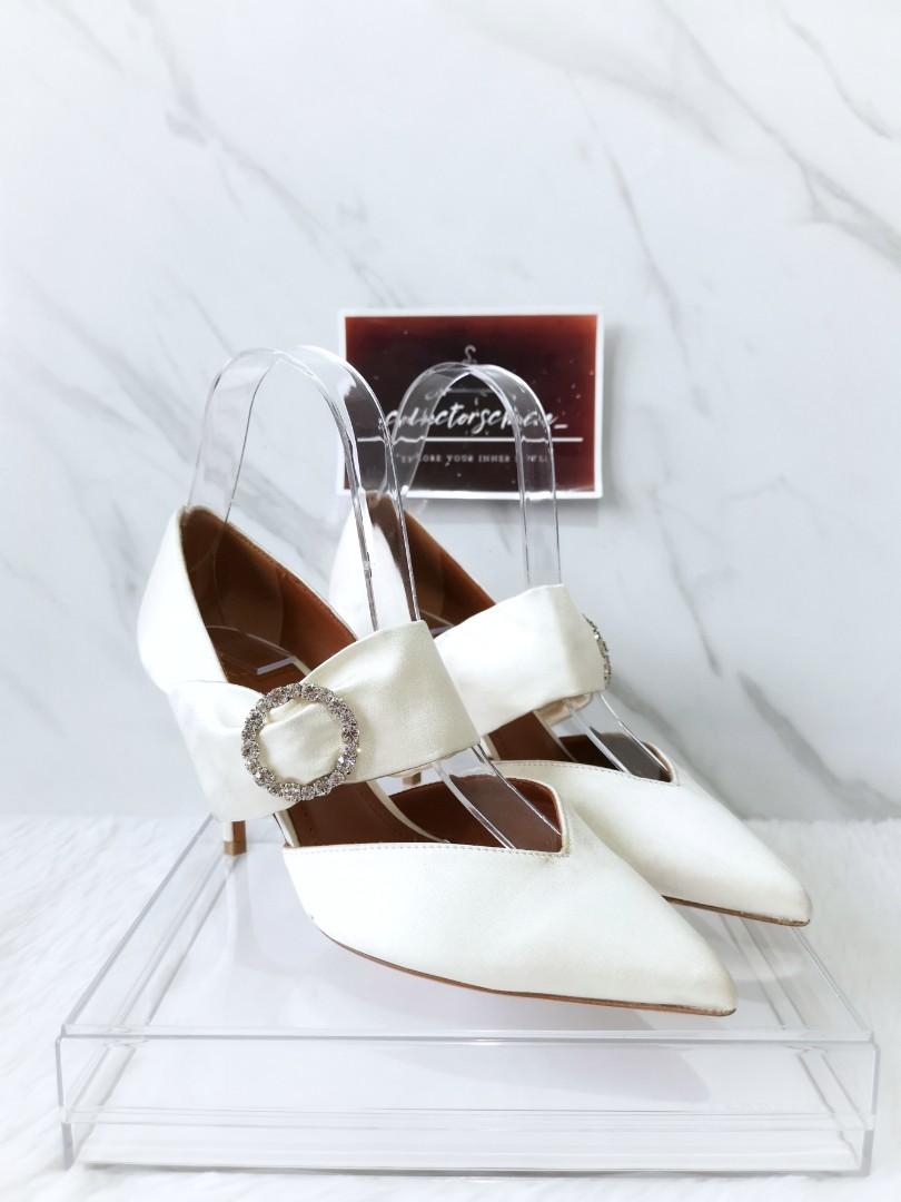 Malone Souliers Maite Crystal-Buckle Satin Point-Toe Pumps (Category: Sneakers & Footwear) located in Makati City. Submitted by _collectorschoice_ (Listing ID 1178401517, Image 2). Description: ° Malone Souliers satin pumps with crystal buckle detail ° Crossover strap with elastic insert at mid-vamp ° Hand made in Italy ° Exterior material: Satin ° Lining material: Leather ° Insole Material: Leather ° Sole Material: Leather ° Hardware: Silver Ton