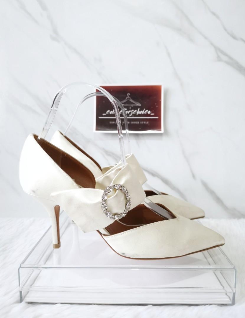 Malone Souliers Maite Crystal-Buckle Satin Point-Toe Pumps (Category: Sneakers & Footwear) located in Makati City. Submitted by _collectorschoice_ (Listing ID 1178401517, Image 3). Description: ° Malone Souliers satin pumps with crystal buckle detail ° Crossover strap with elastic insert at mid-vamp ° Hand made in Italy ° Exterior material: Satin ° Lining material: Leather ° Insole Material: Leather ° Sole Material: Leather ° Hardware: Silver Ton