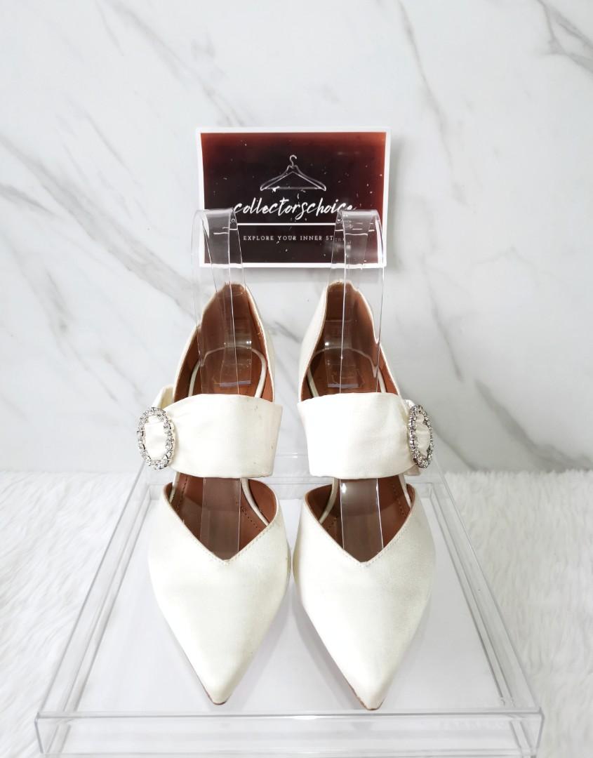 Malone Souliers Maite Crystal-Buckle Satin Point-Toe Pumps (Category: Sneakers & Footwear) located in Makati City. Submitted by _collectorschoice_ (Listing ID 1178401517, Image 1). Description: ° Malone Souliers satin pumps with crystal buckle detail ° Crossover strap with elastic insert at mid-vamp ° Hand made in Italy ° Exterior material: Satin ° Lining material: Leather ° Insole Material: Leather ° Sole Material: Leather ° Hardware: Silver Ton