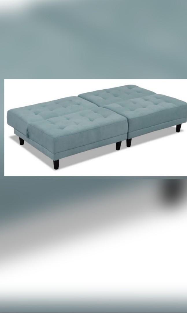 Sofa bed (Category: Sofas) located in Singapore. Submitted by carrotti777 (Listing ID 1178422934, Image 2). Description: fabric. turquoise. can sit, lean or lie down 3 ways. some gentle stains but we always use sofa cover 2-3 layers. no broken. fabric still good. between like new to well used. self collect at 610119 can fit in van. pls collect by today or tmr Monday 22 Aug latest..