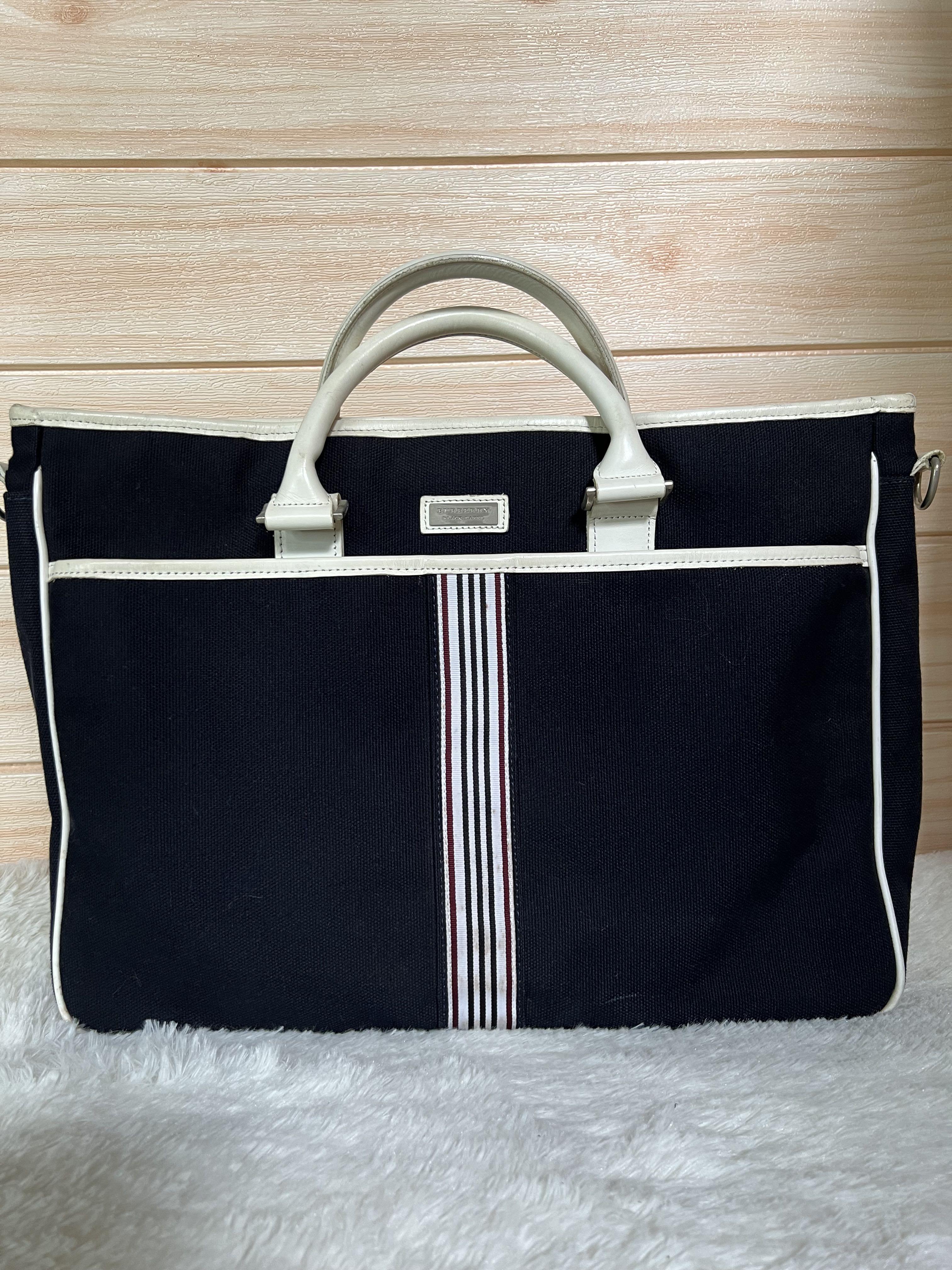 Authentic Burberry Laptop Bag (Category: Luxury Bags & Wallets) located in Cagayan de Oro. Submitted by riggstuffs (Listing ID 1131194641, Image 1). Description: Preloved bag from Japan source Guaranteed Authentic Black label tag The Interior and exterior area is very good condition With long strap Dimension: 11x 17 in inches Handle drop 3.5” Almost new DISCLAIMER: Riggstuffs is not affiliated or associated with any brand posted. All trademarks a