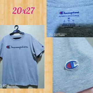 Champion script M on tag