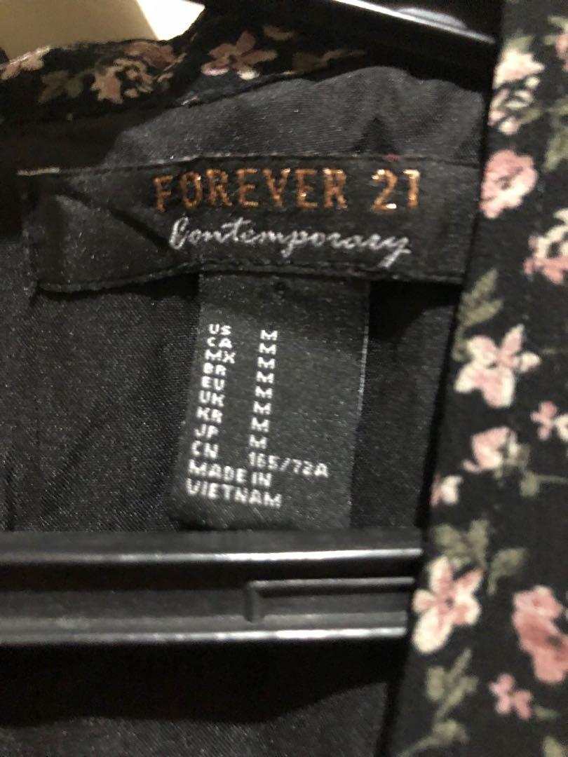Forever 21 Black Floral Romper (Category: Rompers) located in Angeles City. Submitted by sweeetoooth (Listing ID 1178576605, Image 2). Description: Used only twice In good condition RFs: Decluttering Size: Medium.
