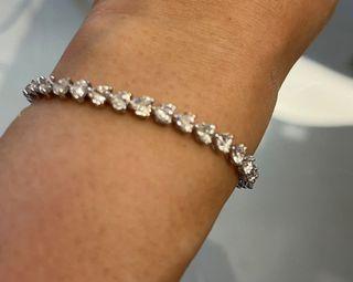 Heart diamond bracelet 20 pt solitaires each