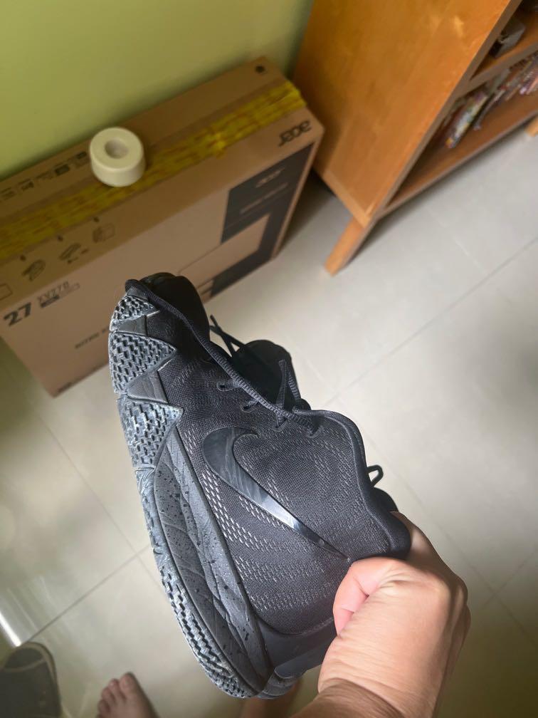 Kyrie 4 triple store black on feet