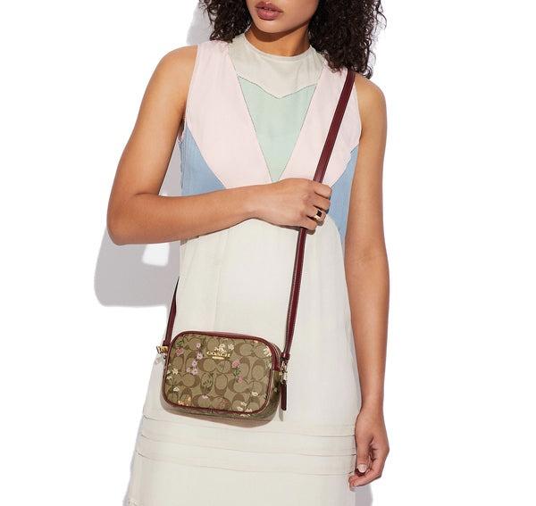 Mini camera bag in signature canvas coach 2025