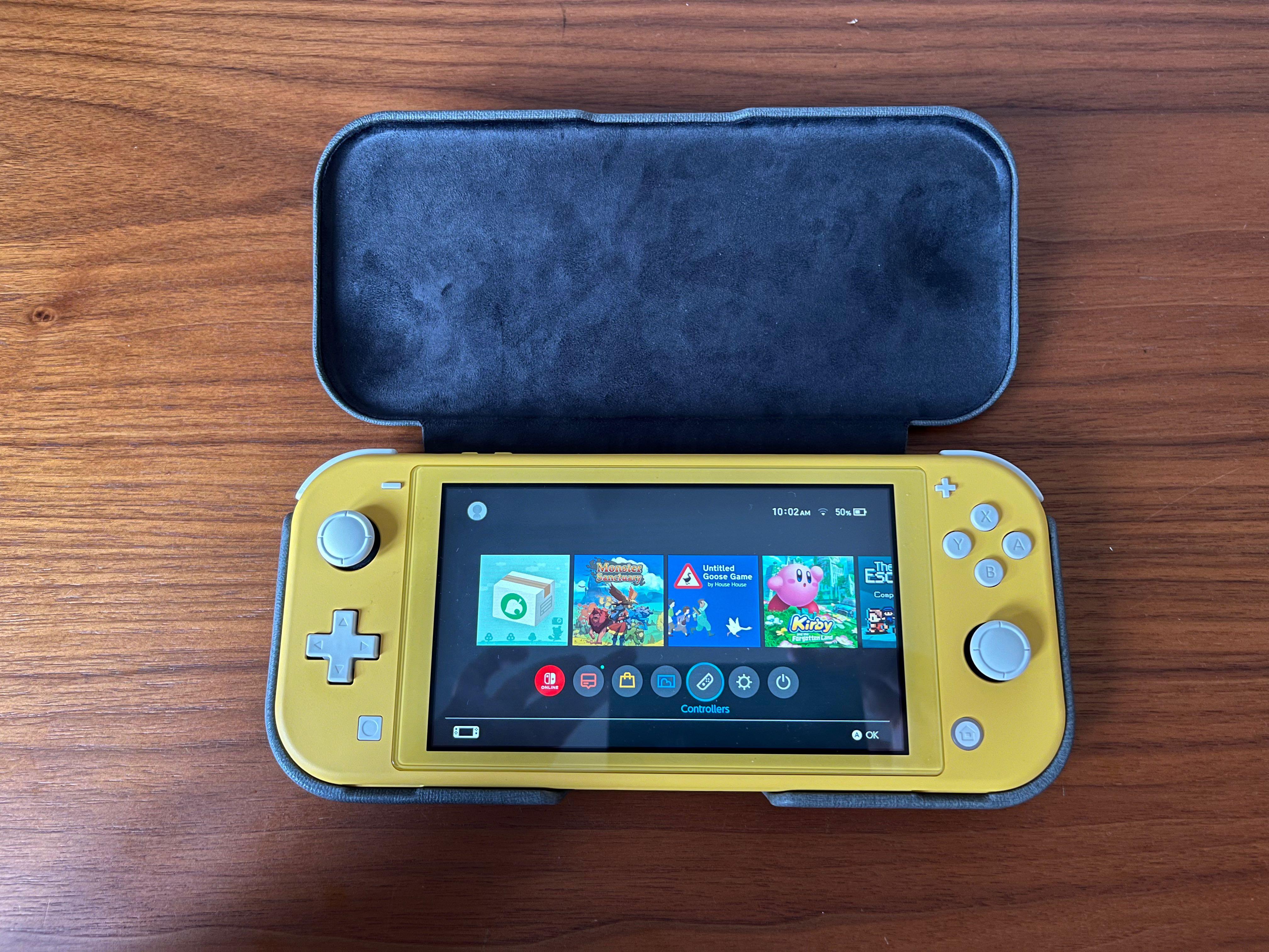 Nintendo Switch Lite (Yellow) with magnetic case, Video Gaming 