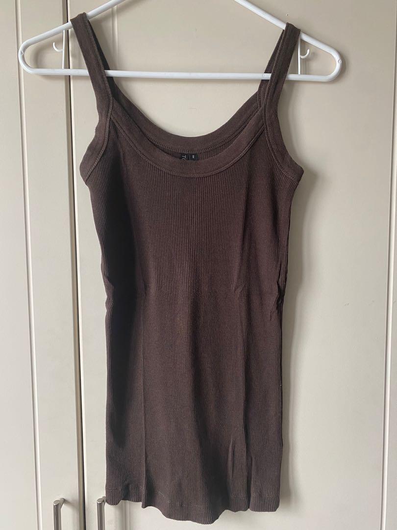 Topshop Ribbed Tank Top (Category: Sleeveless) located in Quezon City. Submitted by inxshop (Listing ID 1178485859, Image 1). Description: Topshop Ribbed Tank Top Size 8 Brown color Cotton Can fit up to S/M frames Stretchable .