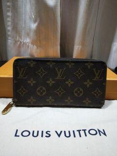 Authentic Louis Vuitton Zipped Around Long Wallet
