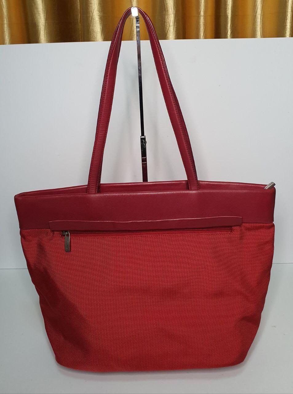 tumi red tote